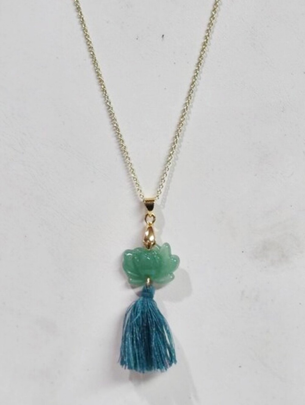 Gold Tone Chain Necklace with Green Carved Jadite lotus flower and Blue Tassel